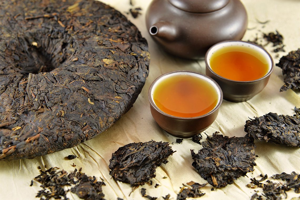 Puer cake and a cup of brew